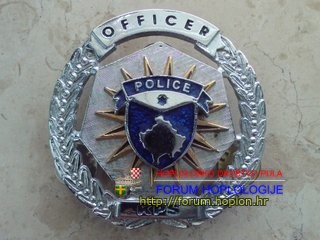 Kosovo police - KPS officer badge nr. 3301 - obsolete.jpg