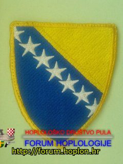 Bosna i Hercegovina - grb uz oznaku granične policije.jpg